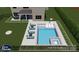 Backyard pool and spa with lounge chairs and outdoor dining area; perfect for relaxing and entertaining at 262 Country Lake Dr, Mooresville, NC 28115