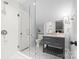 Updated bathroom with glass-enclosed shower, modern vanity, and sleek fixtures at 2900 Wickersham Rd, Charlotte, NC 28211