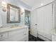 Elegant bathroom with marble countertop, modern fixtures, and a view into the adjacent bedroom at 2900 Wickersham Rd, Charlotte, NC 28211