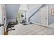Home gym featuring workout equipment and a window providing natural light at 2900 Wickersham Rd, Charlotte, NC 28211
