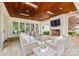 Cozy outdoor patio with stone flooring, fireplace, and comfortable seating, perfect for entertaining guests at 2900 Wickersham Rd, Charlotte, NC 28211