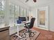 Inviting home office with a comfortable chair, a ceiling fan, and plenty of space to work at 3128 Country Club Dr, Charlotte, NC 28205