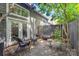 Secluded backyard with a patio, chairs, and a peaceful atmosphere at 3131 Heathstead Pl, Charlotte, NC 28210