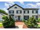 Traditional two-story home with a brick walkway and well-manicured landscaping at 3131 Heathstead Pl, Charlotte, NC 28210