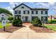 Charming two-story home with classic architecture and landscaped front yard at 3131 Heathstead Pl, Charlotte, NC 28210