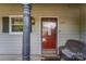 Close-up of the front door with security features and charming decor, enhancing curb appeal at 3131 Heathstead Pl, Charlotte, NC 28210