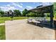 Community gazebo with picnic tables offers a relaxing outdoor gathering spot for residents at 3131 Heathstead Pl, Charlotte, NC 28210