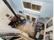 Cozy living room with wood floors, a fireplace, and access to the backyard through French doors at 3131 Heathstead Pl, Charlotte, NC 28210
