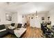 Cozy living room with comfortable seating and ample natural light at 3131 Heathstead Pl, Charlotte, NC 28210