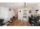Bright and airy living space with wood floors connecting seamlessly to the kitchen at 3131 Heathstead Pl, Charlotte, NC 28210