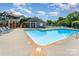 The community pool offers a cool respite with ample lounge seating and sparkling water at 3131 Heathstead Pl, Charlotte, NC 28210