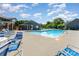 Community pool area offers a refreshing escape with lounge chairs and a sunny environment at 3131 Heathstead Pl, Charlotte, NC 28210