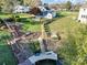Expansive backyard featuring lush landscaping, a private dock and multiple staircases at 317 Commodore Loop, Mooresville, NC 28117