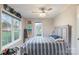 Comfortable bedroom with natural light, sports decor, and a cozy queen-sized bed at 317 Commodore Loop, Mooresville, NC 28117