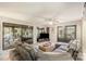 Living room with cozy gray sectional sofa, stylish coffee table and access to a patio through sliding doors at 317 Commodore Loop, Mooresville, NC 28117