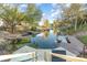 Scenic waterfront view with multiple docks, offering direct access to the water at 317 Commodore Loop, Mooresville, NC 28117