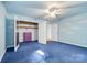 Spacious bedroom includes an open closet and unique cloud paint design at 332 York Spann Rd, Hamptonville, NC 27020