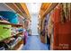 Walk-in closet with organized shelving and hanging space for clothing and accessories at 332 York Spann Rd, Hamptonville, NC 27020