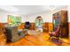 Cozy living room with hardwood floors, rocking chair, and lots of light at 332 York Spann Rd, Hamptonville, NC 27020