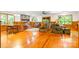 Spacious living room with hardwood floors, stone fireplace, and plenty of natural light at 332 York Spann Rd, Hamptonville, NC 27020