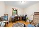 Office space with natural light, wooden desk, and ample room for storage at 332 York Spann Rd, Hamptonville, NC 27020