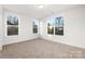 Inviting bedroom features plush carpet and two bright sunny windows at 3888 12Th Ne St, Hickory, NC 28601