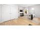 Bright living room with neutral walls, area rug, furnishings, and large windows at 3888 12Th Ne St, Hickory, NC 28601