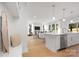 Bright, open-concept living room with hardwood floors, lots of light and modern furnishings at 3888 12Th Ne St, Hickory, NC 28601
