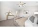 Tranquil main bedroom with vaulted ceiling, neutral tones, a ceiling fan, and stylish decor at 3888 12Th Ne St, Hickory, NC 28601