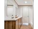 Bathroom features a double sink, wood vanity, and a full mirror creating a functional space at 445 Davis Rd, Shelby, NC 28152