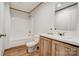 Bathroom featuring a shower, a toilet, and a wood-look vanity at 445 Davis Rd, Shelby, NC 28152