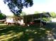 Single-story home with a covered carport, a brick foundation, and a spacious front yard at 44716 Gold Branch Rd, Richfield, NC 28137