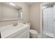 Bright bathroom featuring updated fixtures, vanity with storage, and a walk-in shower at 4815 Nc 109 Hwy, Wadesboro, NC 28170