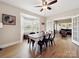 Inviting dining room area featuring hardwood floors, and a large window at 4815 Nc 109 Hwy, Wadesboro, NC 28170