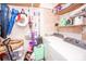 Functional laundry room with washer, dryer and shelving for organizing household essentials at 539 30Th Nw Ave, Hickory, NC 28601