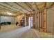 Spacious unfinished basement with exposed ceiling and concrete floor at 54053 Flycatchers Ct, Fort Mill, SC 29707