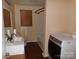Functional bathroom featuring a shower, sink, and washing machine at 556 Roundtree Cir, Chester, SC 29706