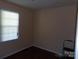 Bright bedroom with a window at 556 Roundtree Cir, Chester, SC 29706