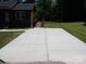 Large concrete driveway leading to the house at 556 Roundtree Cir, Chester, SC 29706