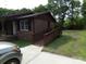 Charming brick home with accessible ramp, neat landscaping and driveway at 556 Roundtree Cir, Chester, SC 29706