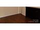Hardwood floors in a living space with a fireplace at 556 Roundtree Cir, Chester, SC 29706