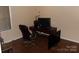 This office has a brown desk and chair with lots of natural light from a window at 556 Roundtree Cir, Chester, SC 29706