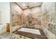 Elegant bathroom with stone tiled walk-in shower and jacuzzi tub at 5719 Doncaster Dr, Charlotte, NC 28211
