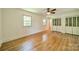 Bright bedroom with hardwood floors, closet space, and two windows at 5719 Doncaster Dr, Charlotte, NC 28211