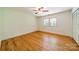 Bedroom featuring hardwood flooring and built in closet at 5719 Doncaster Dr, Charlotte, NC 28211