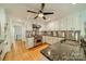 Well-lit kitchen with stainless steel appliances, granite countertops, and modern white cabinetry at 5719 Doncaster Dr, Charlotte, NC 28211