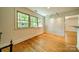Cozy living room featuring hardwood floors, recessed lighting and a bright, airy atmosphere at 5719 Doncaster Dr, Charlotte, NC 28211