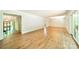 Open concept living room with hardwood floors and great natural light at 5719 Doncaster Dr, Charlotte, NC 28211