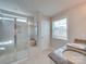 Bright bathroom featuring a glass-enclosed shower, granite counters, and a neutral color scheme at 574 Altamonte Dr, Clover, SC 29710