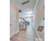 Bright entryway featuring a staircase, light wood floors, and a console table with tasteful decor at 574 Altamonte Dr, Clover, SC 29710
